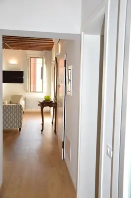 Letto o letti in una camera di Casa Margherita Accademia