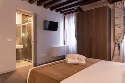 Letto o letti in una camera di Il Pozzo Magico