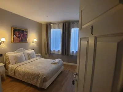 Letto o letti in una camera di B&B Fine Venice