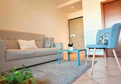 Area soggiorno di Sunset View Treviso Apartment