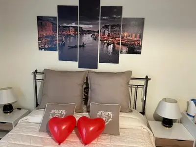 Letto o letti in una camera di Ca' Nadia