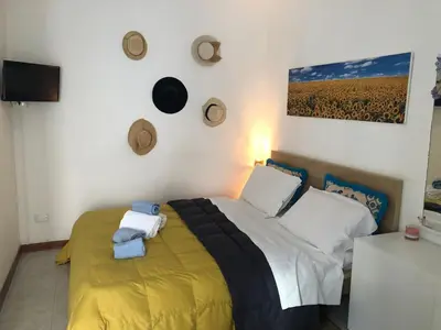 Letto o letti in una camera di Monolocale Liola