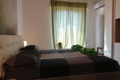 Letto o letti in una camera di PrimoPiano - Venezia Lido