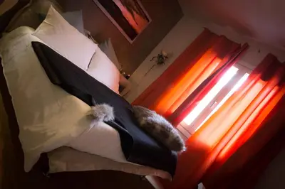 Letto o letti in una camera di Kia ora Suite Apartment
