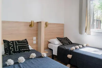 Letto o letti in una camera di Camping Ca' Savio