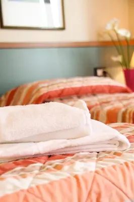 Letto o letti in una camera di Residence Al Bacareto