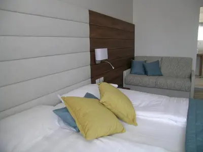Letto o letti in una camera di Hotel Belvedere