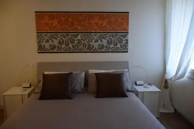 Letto o letti in una camera di Ca' Corte San Rocco