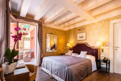 Letto o letti in una camera di Hotel Moresco