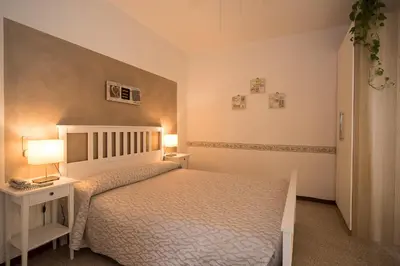 Letto o letti in una camera di Hotel Conchiglia
