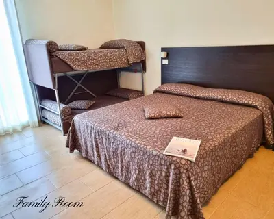 Letto o letti in una camera di Hotel Morena