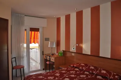 Letto o letti in una camera di Hotel Righetto Fronte Mare
