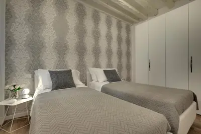 Letto o letti in una camera di Castello - Laguna Luxury Residence by Wonderful Italy