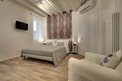 Letto o letti in una camera di Castello - Laguna Luxury Residence by Wonderful Italy