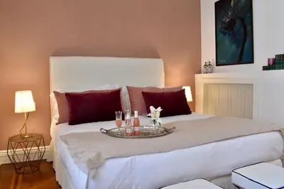 Letto o letti in una camera di Palazzina Mori - Luxury B&B