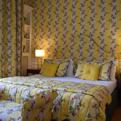 Letto o letti in una camera di Palazzina Mori - Luxury B&B