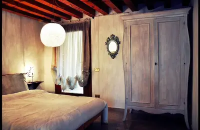 Letto o letti in una camera di Relais nel Castello