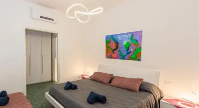 Letto o letti in una camera di Ca San Luca