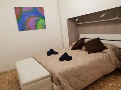 Letto o letti in una camera di Ca San Luca