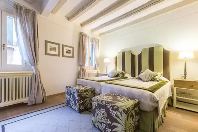 Letto o letti in una camera di Ca' Del Teatro Terrace in San Marco District
