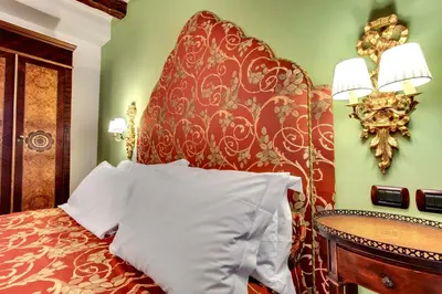Letto o letti in una camera di San Marco Superior Apartments by Wonderful Italy