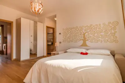 Letto o letti in una camera di SUNNY NEST CANAL VIEW IN VENICE CHIC MOVIDA