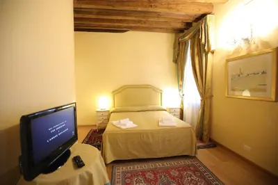 Letto o letti in una camera di Alla Vigna - Room Only