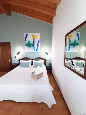 Letto o letti in una camera di Agriturismo Le Cipressine