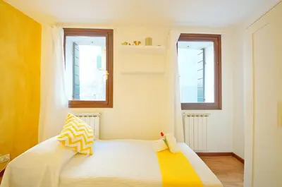 Letto o letti in una camera di San Marco Apartment Fabbri
