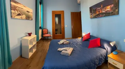 Letto o letti in una camera di TINTORETTO 1 CON TERRAZZA SOPRA IL TETTO, 3 bagni, 3 grandi camere da letto, SUPER NUOVO