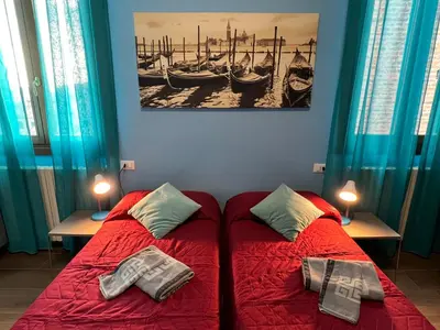 Letto o letti in una camera di TINTORETTO 1 CON TERRAZZA SOPRA IL TETTO, 3 bagni, 3 grandi camere da letto, SUPER NUOVO