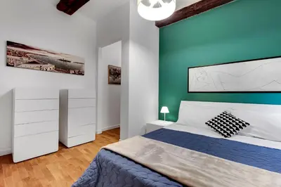 Letto o letti in una camera di Cannaregio Suite with Garden by Wonderful Italy