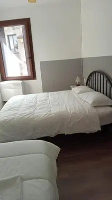 Letto o letti in una camera di Casa Belzoni