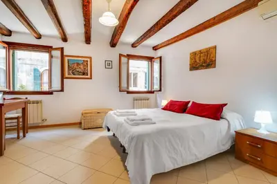 Letto o letti in una camera di B&B Giardini