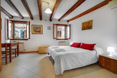 Letto o letti in una camera di B&B Giardini
