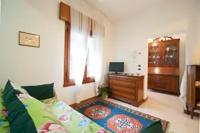 TV o dispositivi per l'intrattenimento presso Guest Host - Lovely Apartment Near Venice