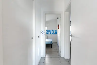Letto o letti in una camera di Condominio Milan