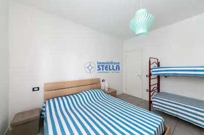 Letto o letti in una camera di Condominio Milan