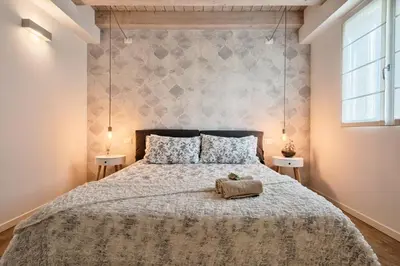 Letto o letti in una camera di Trevisohome BOTTENIGA