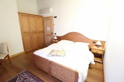 Letto o letti in una camera di Agriturismo Al Credazzo
