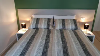 Letto o letti in una camera di SNC1018 MODERN BOUTIQUE APARTMENT