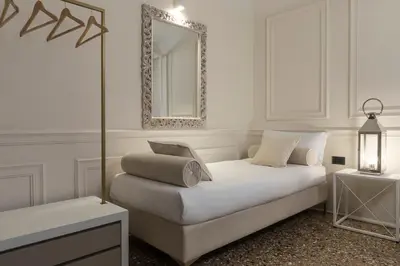 Letto o letti in una camera di San Marco Suite 755