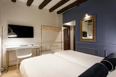 Letto o letti in una camera di San Marco Suite 755