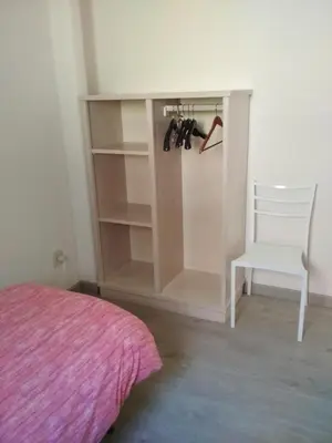 Letto o letti in una camera di vololiberoapartments