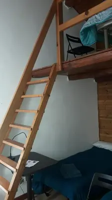 Letto o letti a castello in una camera di Room Family