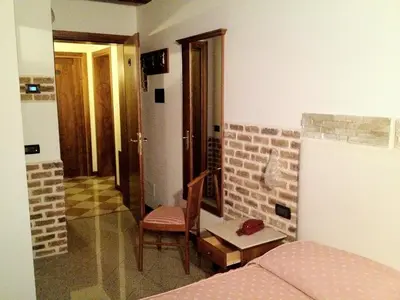 Letto o letti in una camera di Ca'Nova Alloggi