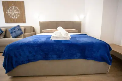 Letto o letti in una camera di Casa Azzurra