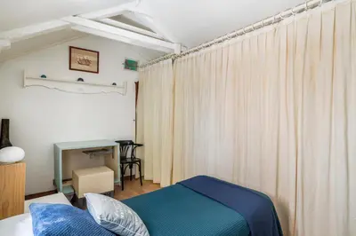 Letto o letti in una camera di Ca Lorosa Cosy and comfortable Loft at Castello