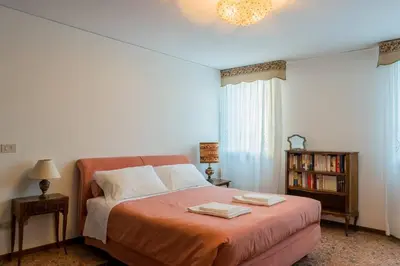 Letto o letti in una camera di Ca' Magno by Venicevillas, dimora storica