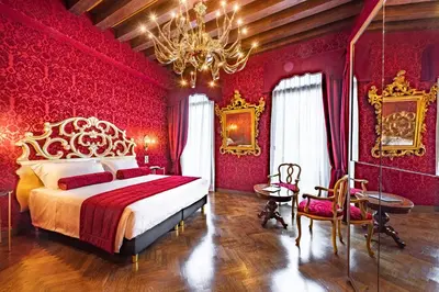 Letto o letti in una camera di Palazzo San Lorenzo